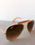 Óculos de Sol Ray Ban Caçador Marrom - www.tpmdeofertas.com.br